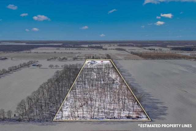 birds eye view of property featuring a rural view