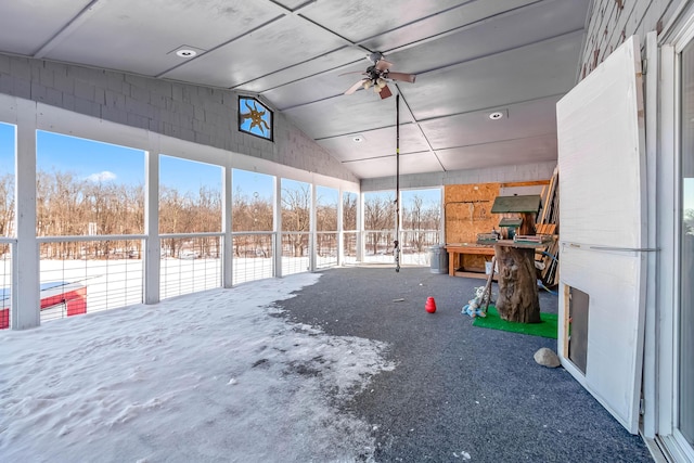 interior space featuring ceiling fan