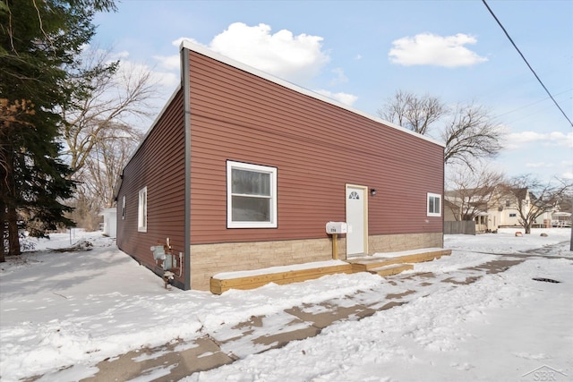 view of snow covered property