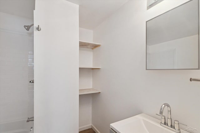 bathroom with sink and bathing tub / shower combination