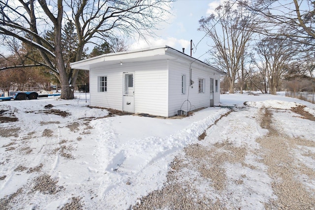 view of snow covered property