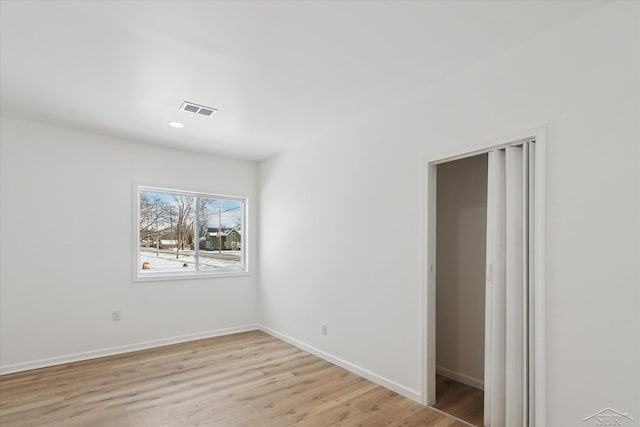 empty room featuring light hardwood / wood-style flooring