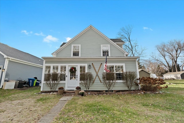 view of front of home featuring a front lawn