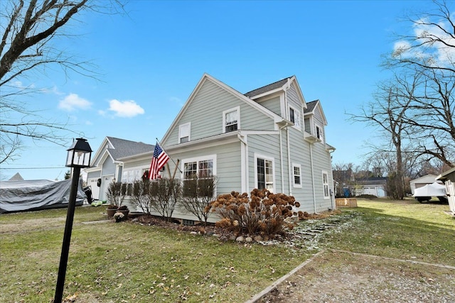 view of side of property with a lawn