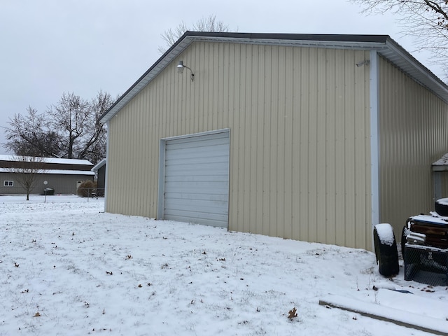 view of snow covered garage