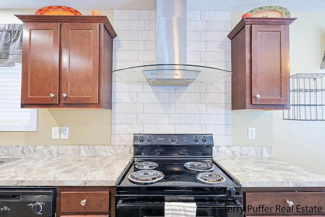 kitchen with extractor fan, black appliances, and decorative backsplash