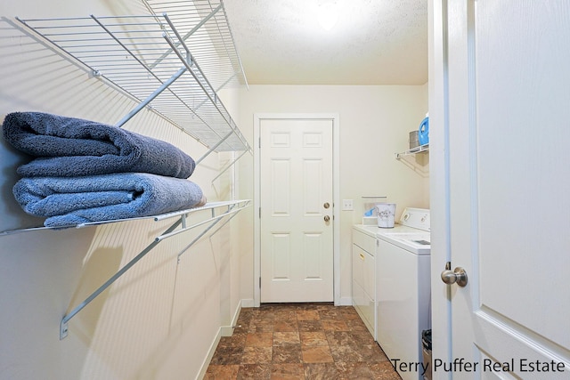 laundry room with washer and clothes dryer