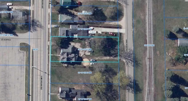 416 S Michigan Ave, Manton, MI 49663 - aerial map of property and surrounding area featuring property parcel outlined