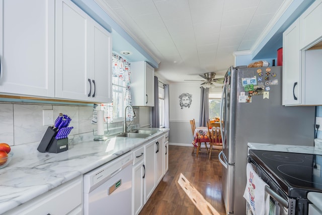 kitchen with sink, white cabinets, dishwasher, ceiling fan, and dark wood-type flooring