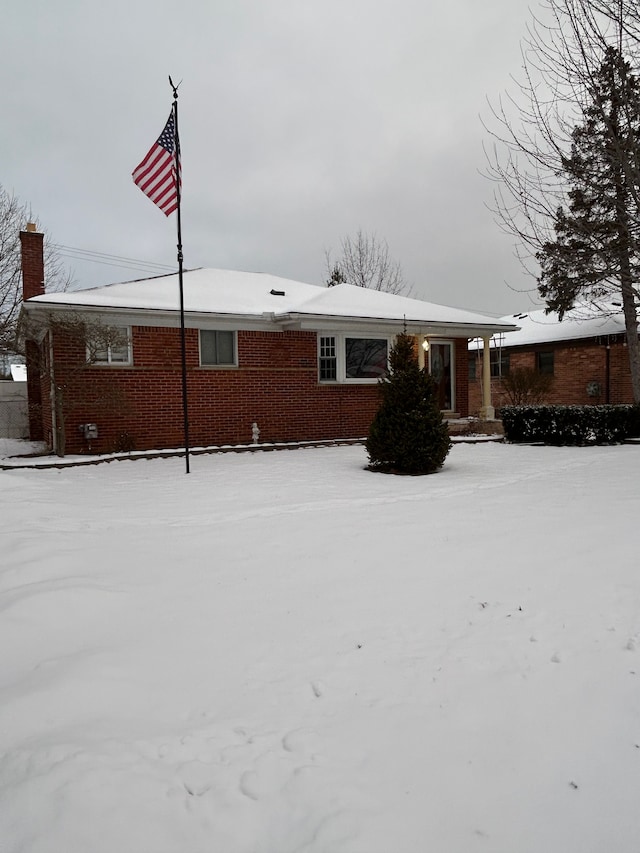 view of snow covered property