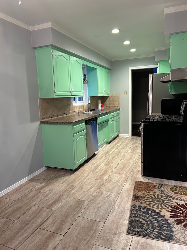 kitchen featuring stainless steel appliances, ventilation hood, ornamental molding, green cabinetry, and backsplash