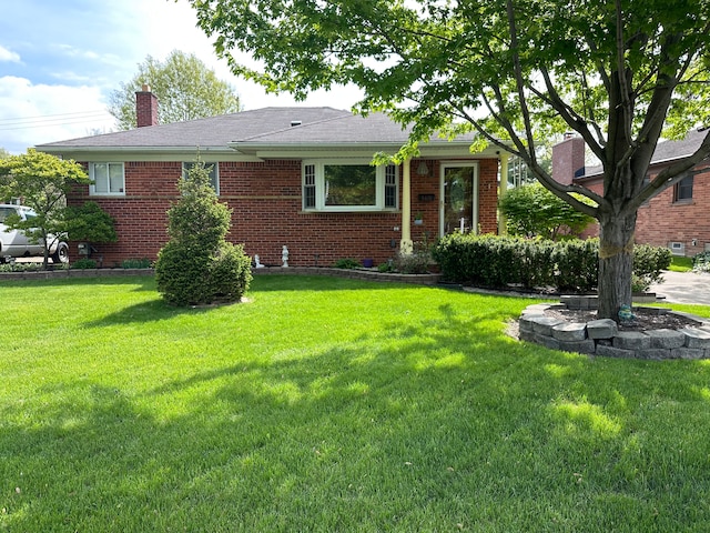 ranch-style home with a front yard