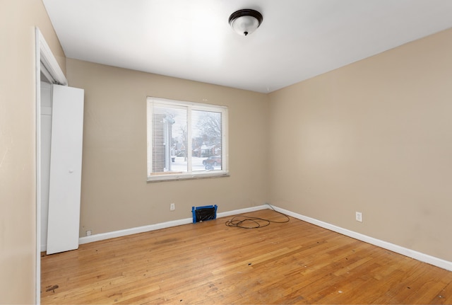 unfurnished bedroom featuring light wood-type flooring