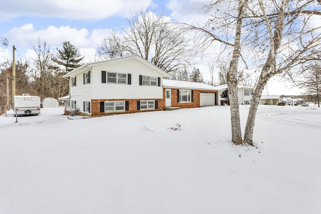 tri-level home featuring a garage