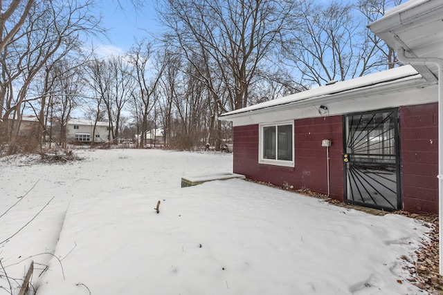 view of yard covered in snow