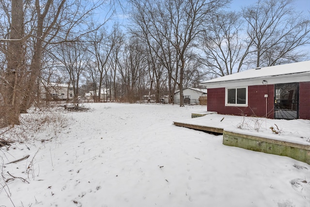 view of yard covered in snow