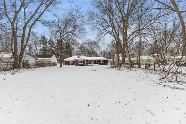 view of yard covered in snow