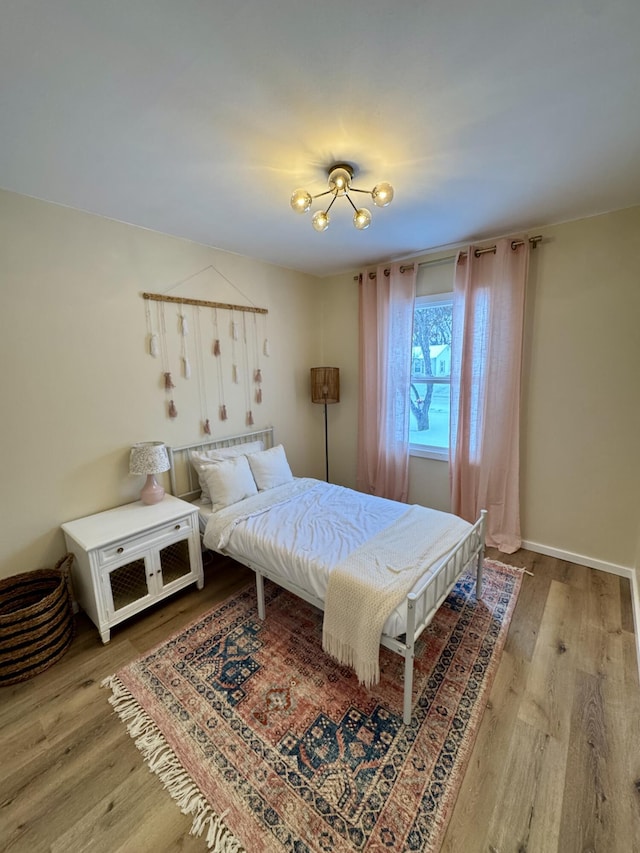 bedroom with light wood-type flooring