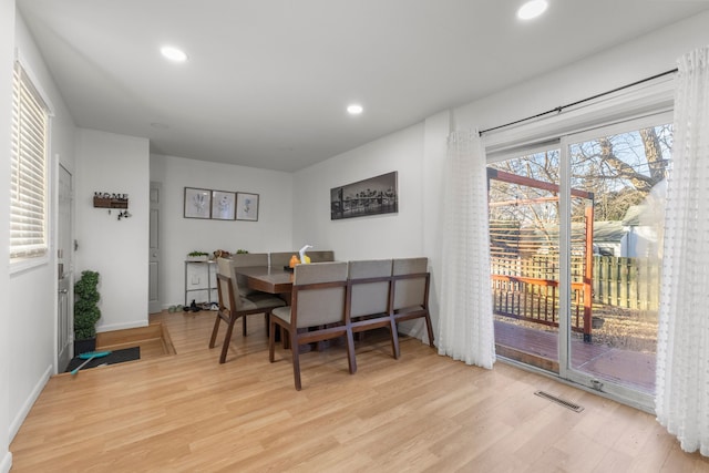 dining room featuring light wood-type flooring