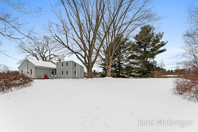 view of yard covered in snow