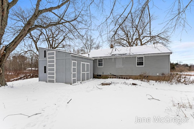 view of snow covered property