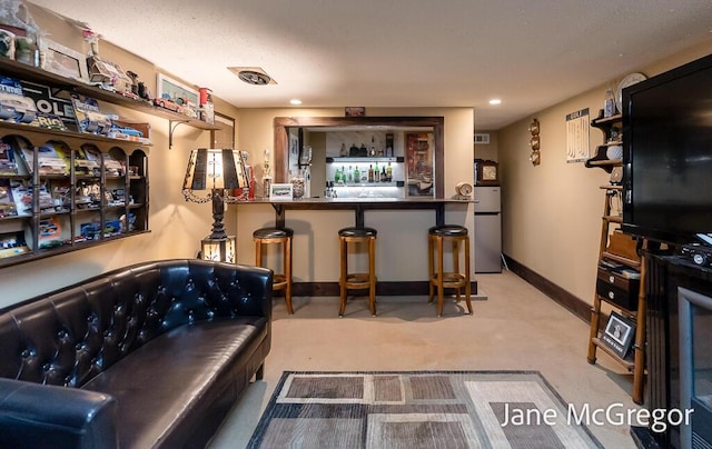 bar with stainless steel fridge