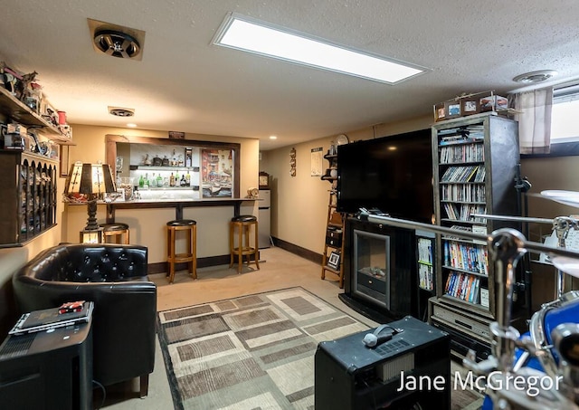 living room with a textured ceiling