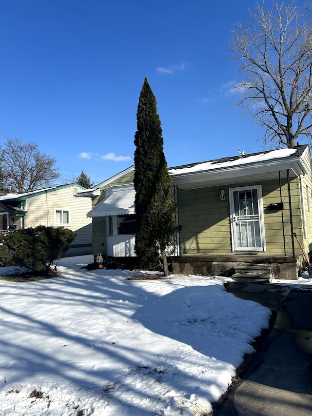 view of snow covered property