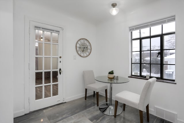 dining room featuring a healthy amount of sunlight