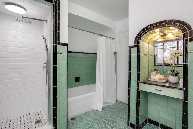 bathroom featuring shower / bath combo and tile patterned floors