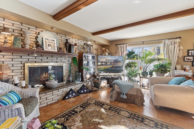 living room featuring a brick fireplace, parquet floors, and beamed ceiling