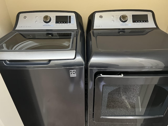 laundry room with washer and dryer