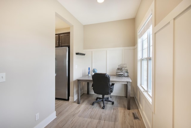 office space featuring light hardwood / wood-style flooring