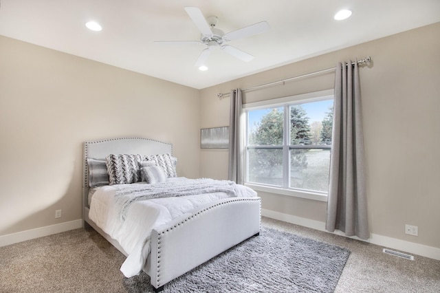 carpeted bedroom with ceiling fan