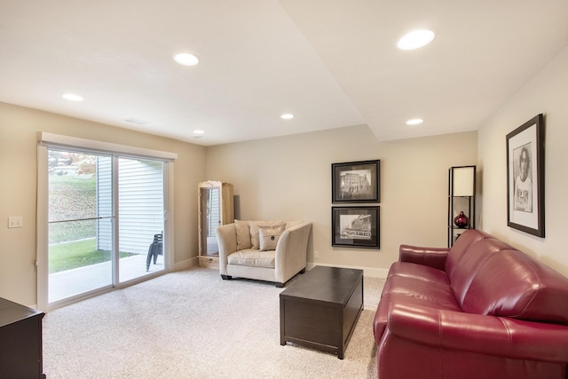 living room featuring light colored carpet