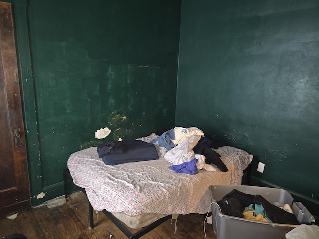 bedroom featuring wood-type flooring