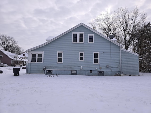 view of snow covered property