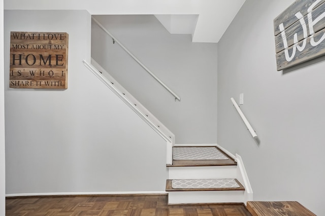 stairs with parquet flooring