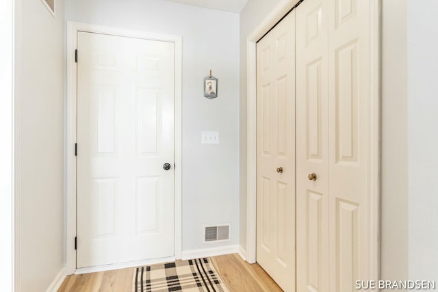 corridor featuring light hardwood / wood-style flooring