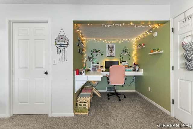 view of carpeted office space