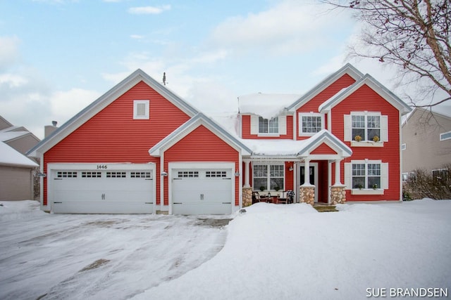 view of front of property with a garage