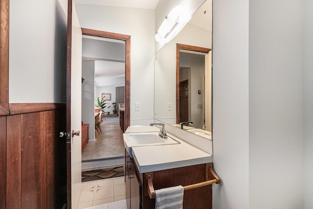 bathroom featuring tile patterned floors and vanity