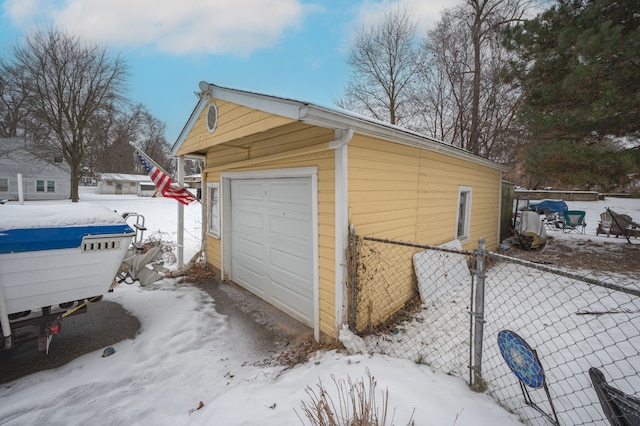 view of snow covered garage