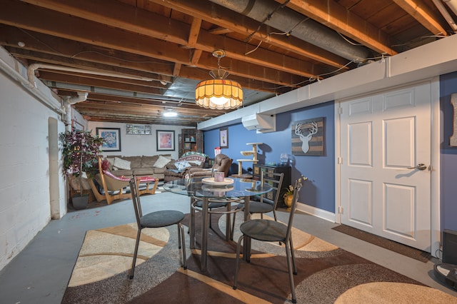 dining room featuring an AC wall unit