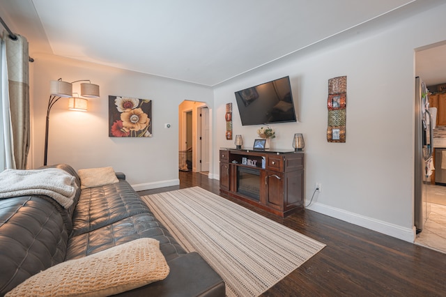 living room with dark wood-type flooring