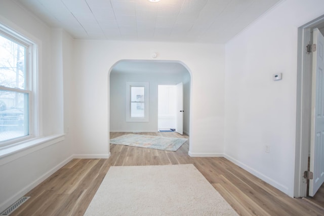 hall with light hardwood / wood-style floors