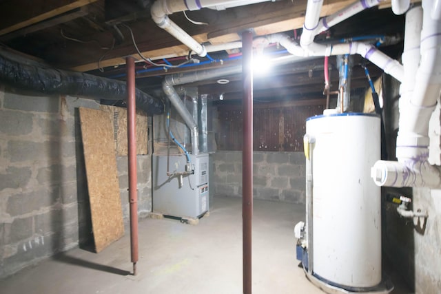 basement with heating unit and gas water heater