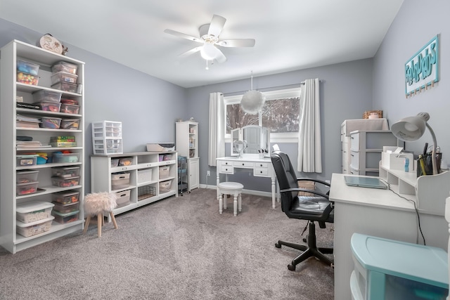 home office with carpet floors and ceiling fan