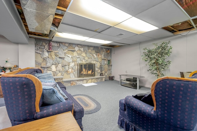 living room with a fireplace and carpet flooring