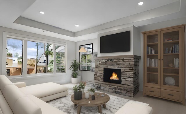 5157 Blendon Wds Ct Unit 15, Hudsonville, MI 49426 - living area featuring a stone fireplace, recessed lighting, and a raised ceiling